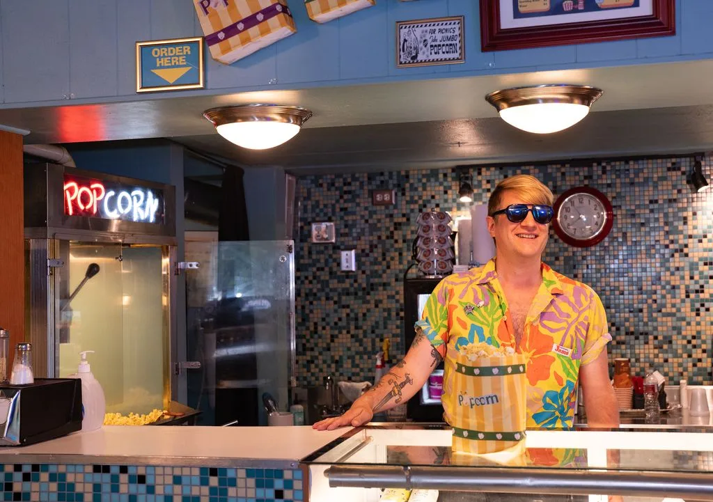 Hi-Pointe Theatre event coordinator Josh Jenkins books music-themed films with live bands and performers in the century-old theater hall.