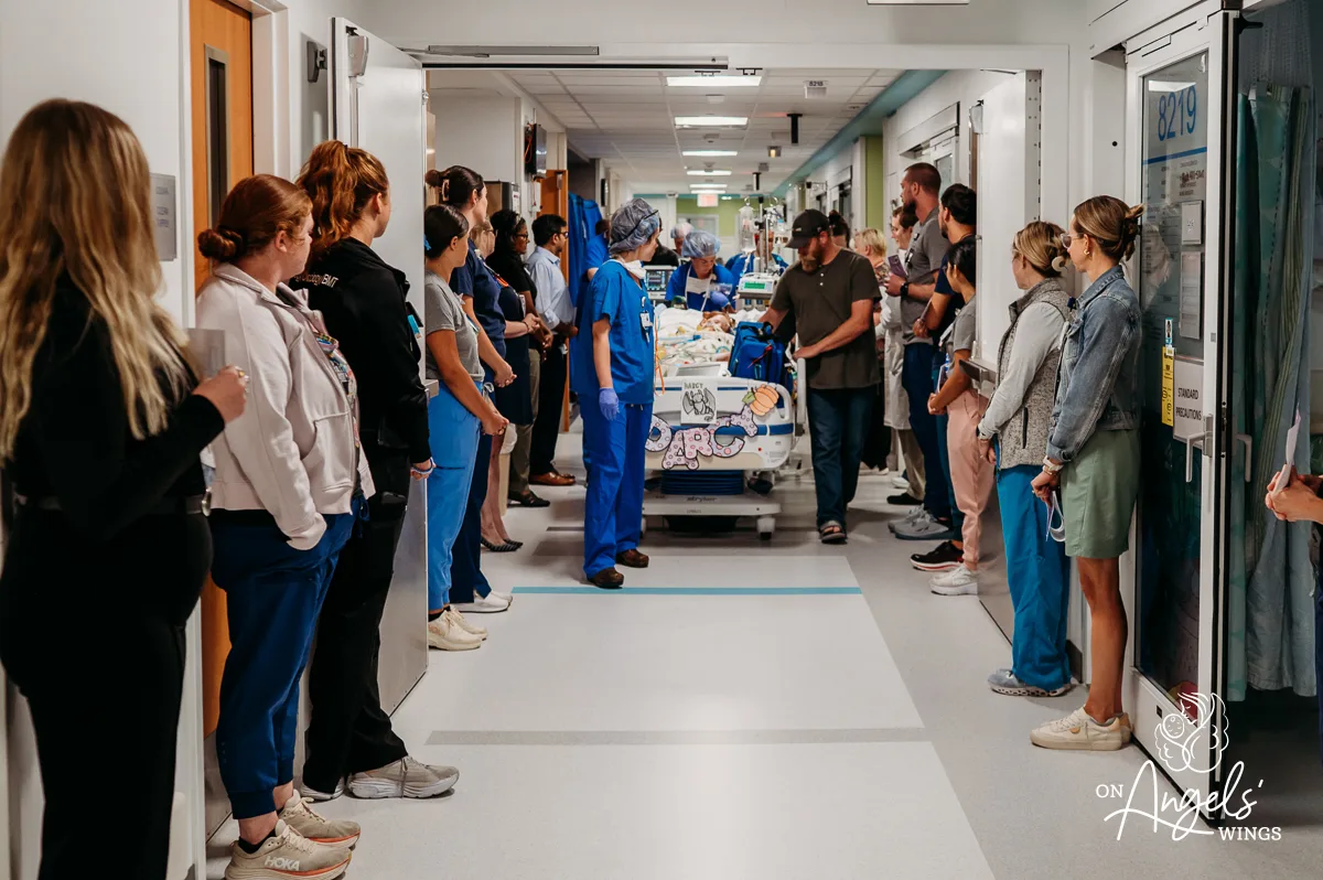 A community of hospital staff stands together, supporting families through life’s most critical moments.