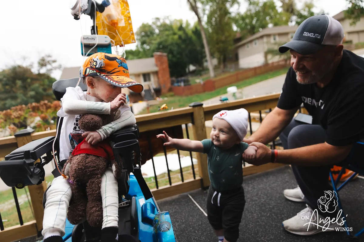 Connection goes beyond words. On Angels' Wings captures the bonds that carry families through every journey.