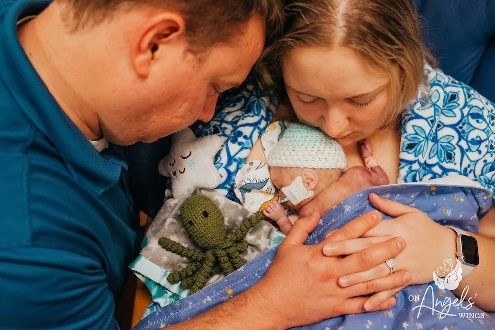Katie and Carl Schwarz with their son Hudson.