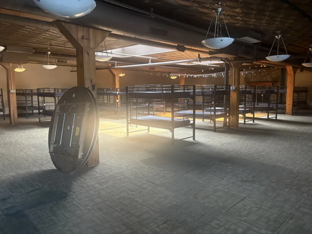 Bunk beds inside a large room.