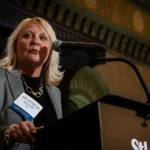 Shannon Hauf with Bayer speaking at the Business 500 event